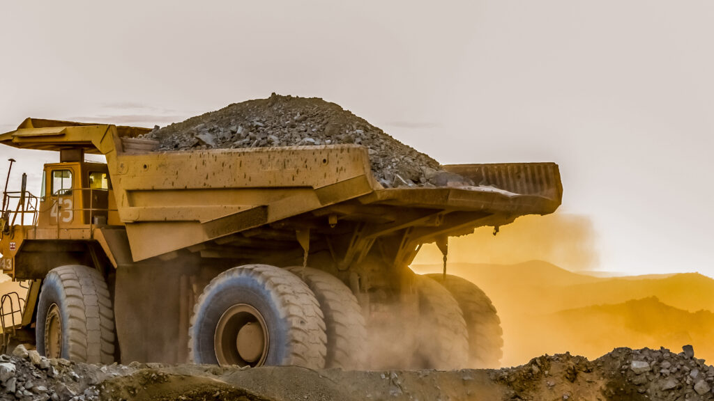 large truck carrying sand on a platinum mining site in africa